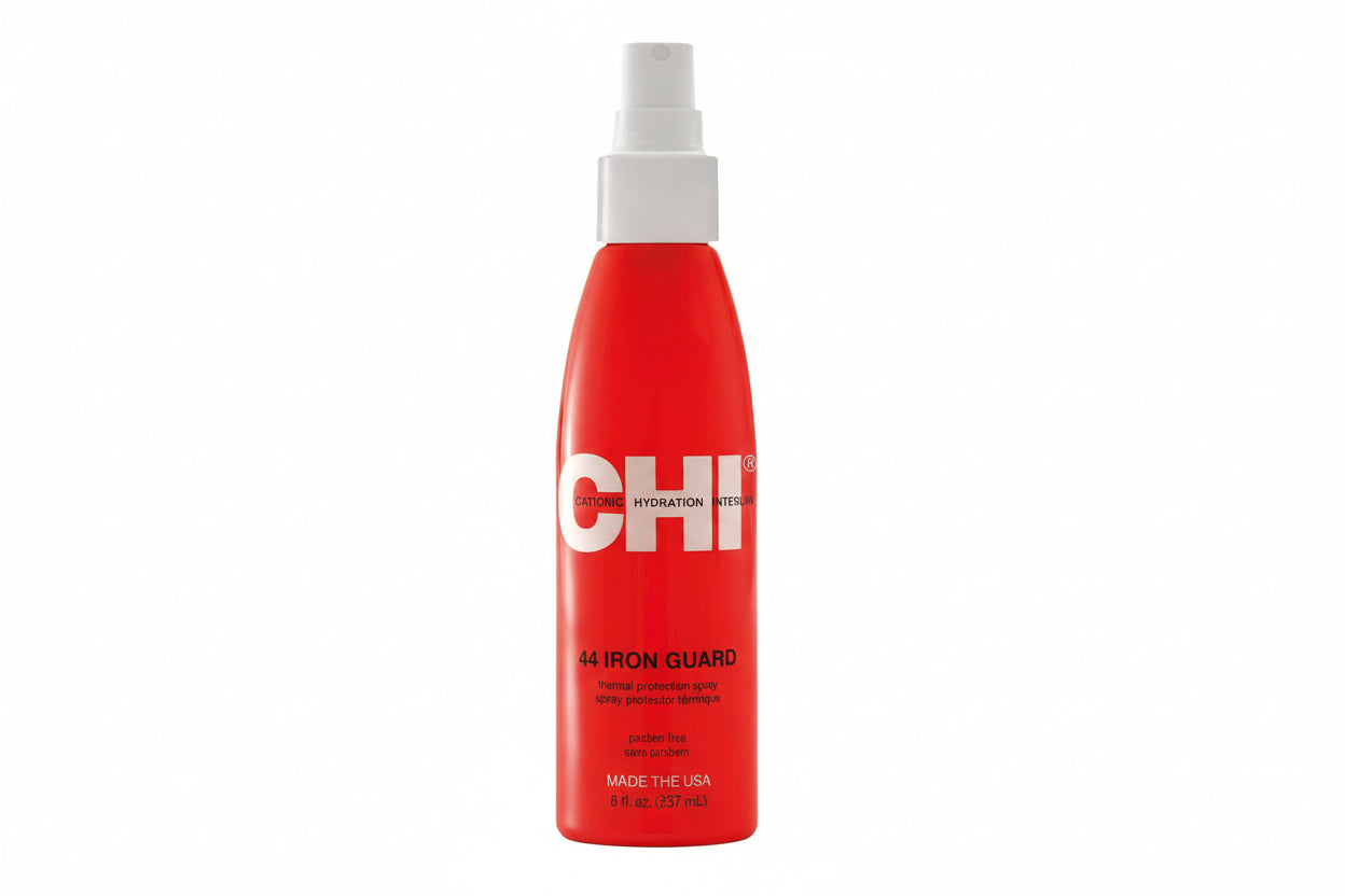 A red bottle of CHI CHI44 Iron Guard Thermal Protection Spray with a white spray nozzle.