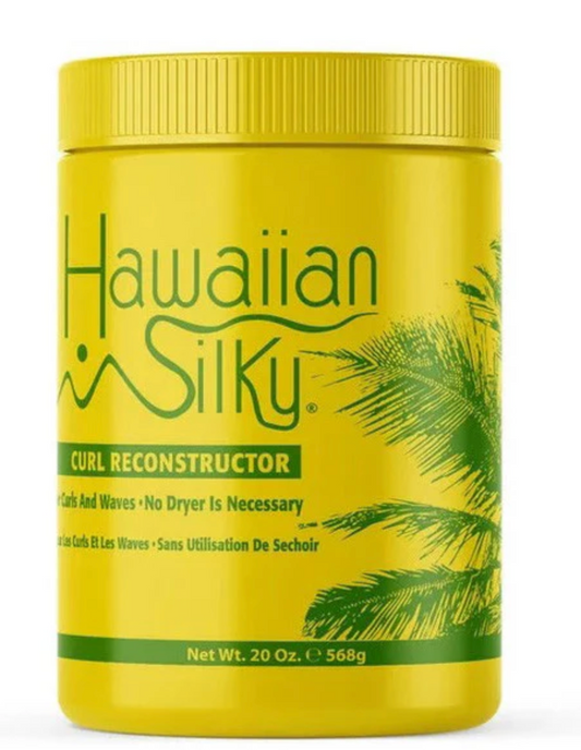 Woman applying Hawaiian Silky Curl Reconstructor to defined curly hair