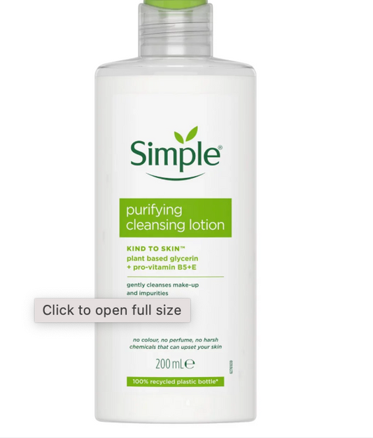 Simple Kind To Skin Purifying Cleansing Lotion bottle on bathroom counter