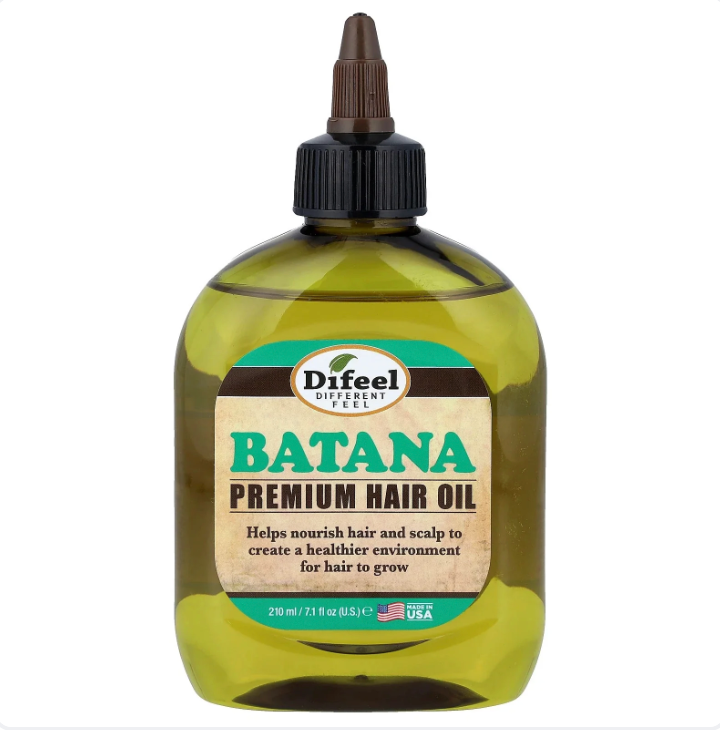 Difeel Batana Premium Hair Oil bottle showing 100% pure natural ingredients for hair nourishment