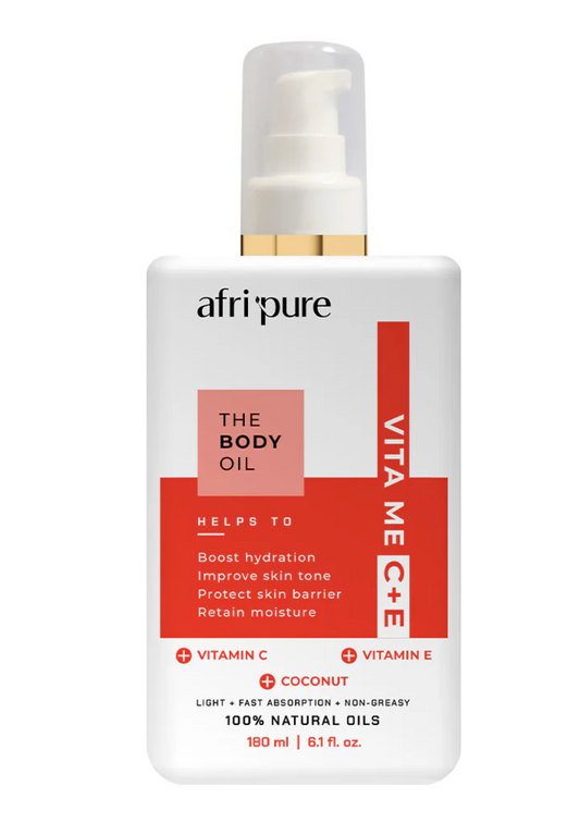 Woman applying vitamin-enriched body oil to smooth glowing skin