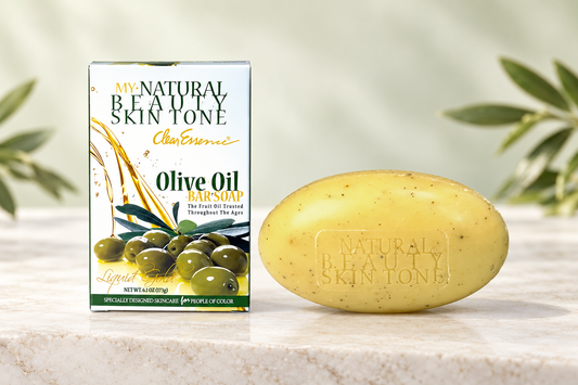 Clear Essence My Natural Beauty Olive Oil Soap box beside its yellow oval cleansing bar