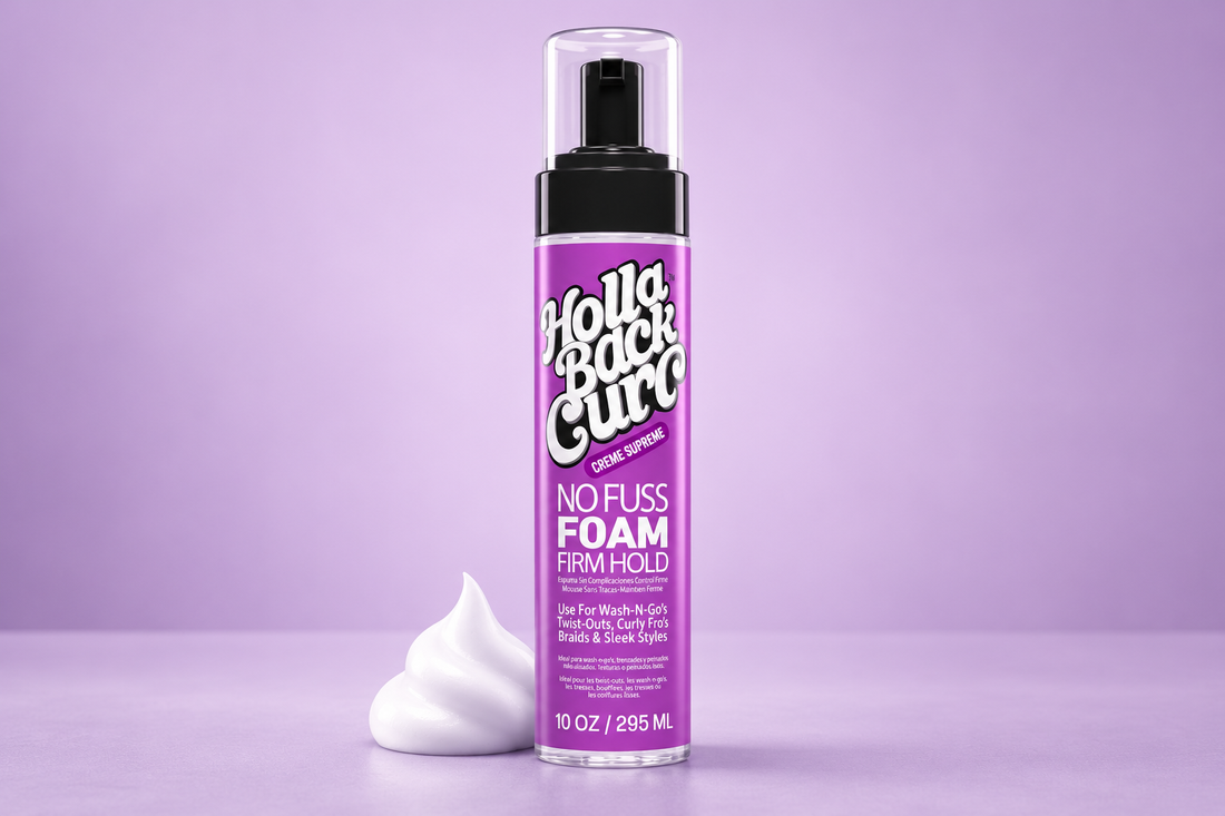 Holla Back Curl No Fuss Firm Hold Foam 10oz purple bottle beside styling foam on a lilac background.