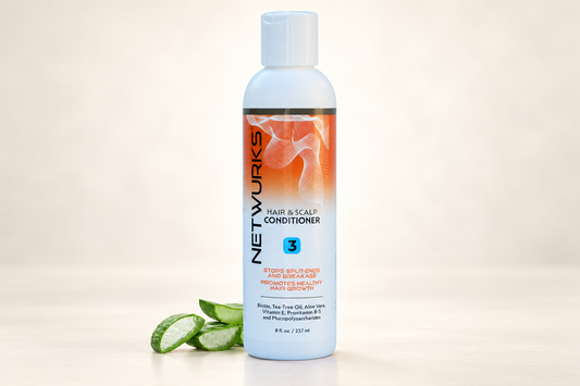 Netwurks Hair and Scalp Conditioner 237ml bottle beside aloe leaves on a cream studio background.