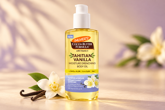 Palmer’s Tahitian Vanilla Body Oil 192ml pump bottle with vanilla flowers on a cream background.