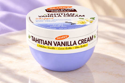 Palmer's Tahitian Vanilla Whipped Body Cream 250g lavender tub on a cream studio surface