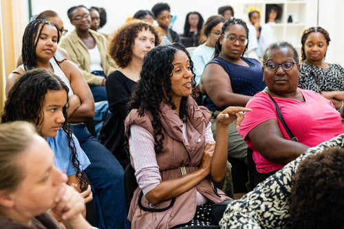Attendees listening during a workshop discussion.