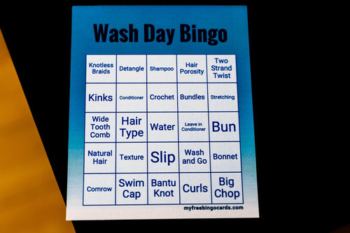 Wash Day Bingo activity card displayed on a table.